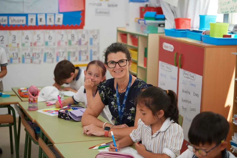 Teacher with pre school students in the classroom 