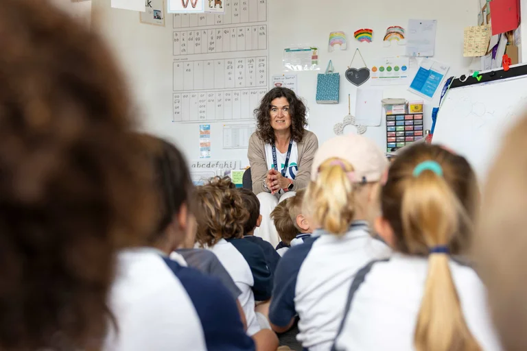 Teacher with students in the classroom
