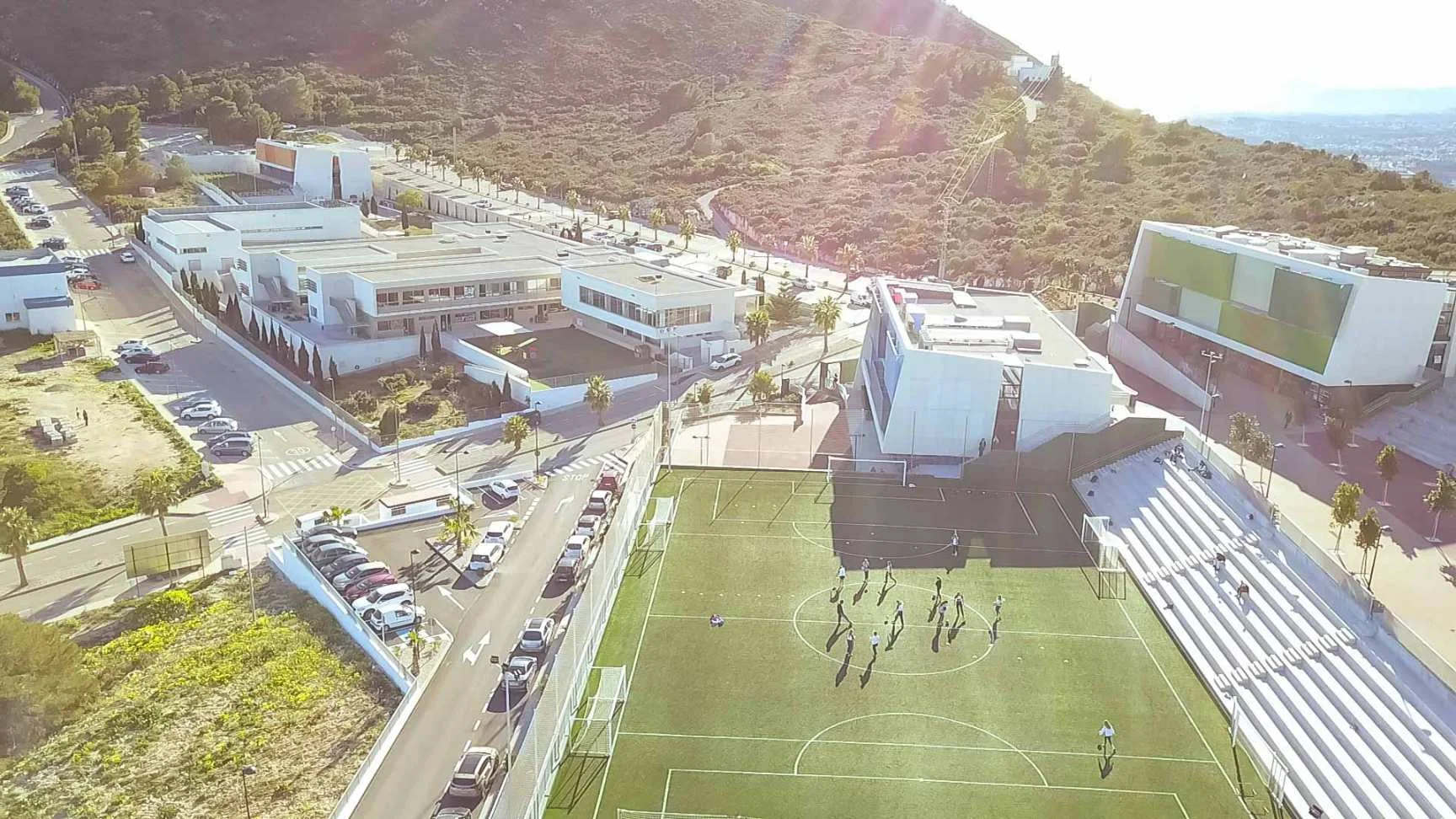 Image of the school with soccer field