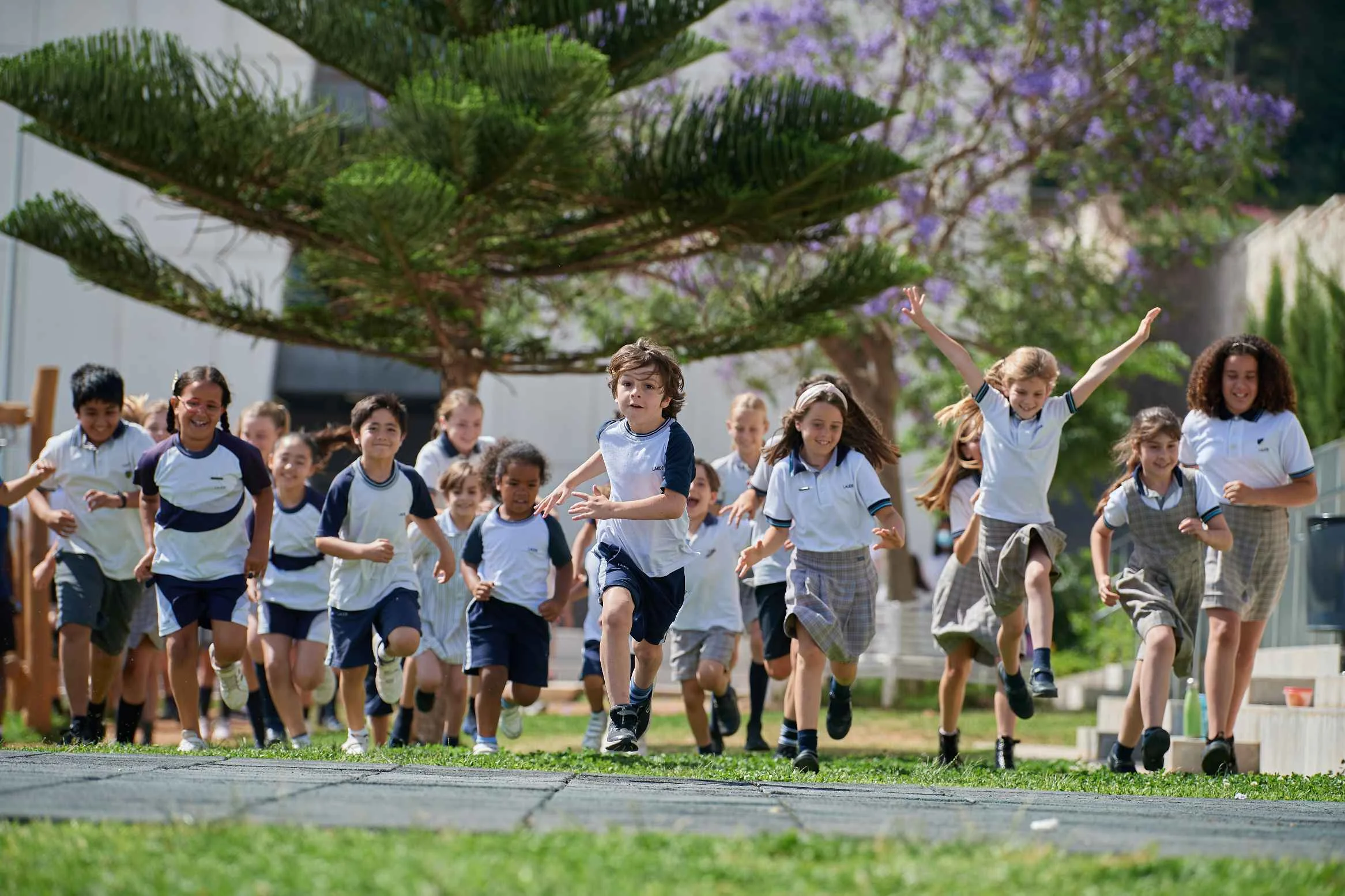 children running in the schoolyard