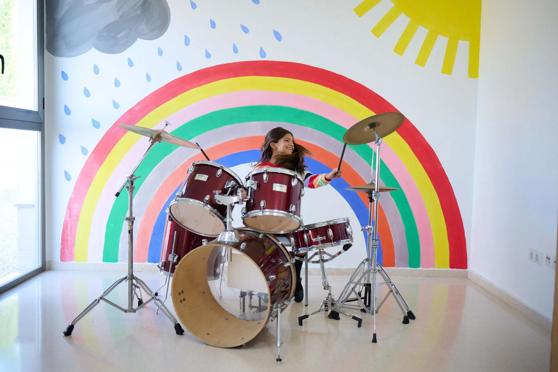 Student playing drums