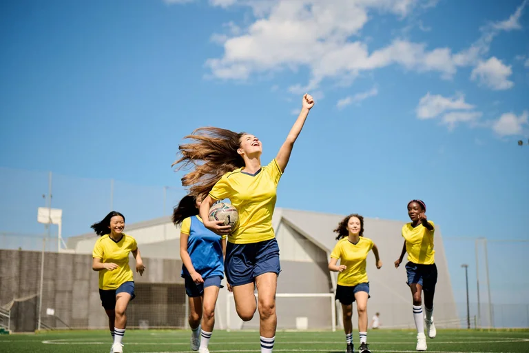 student exults after gol