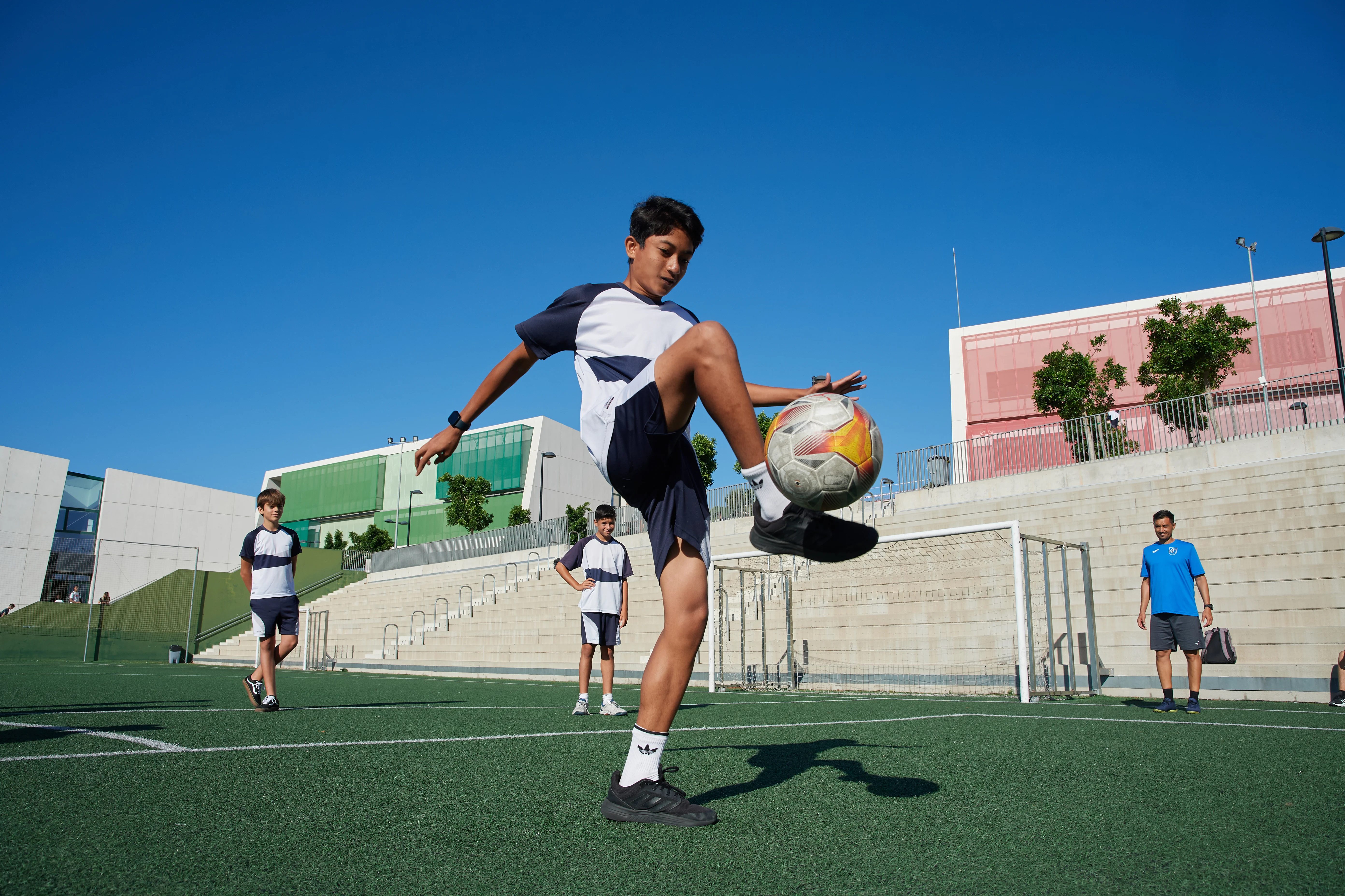 Student playing soccer 