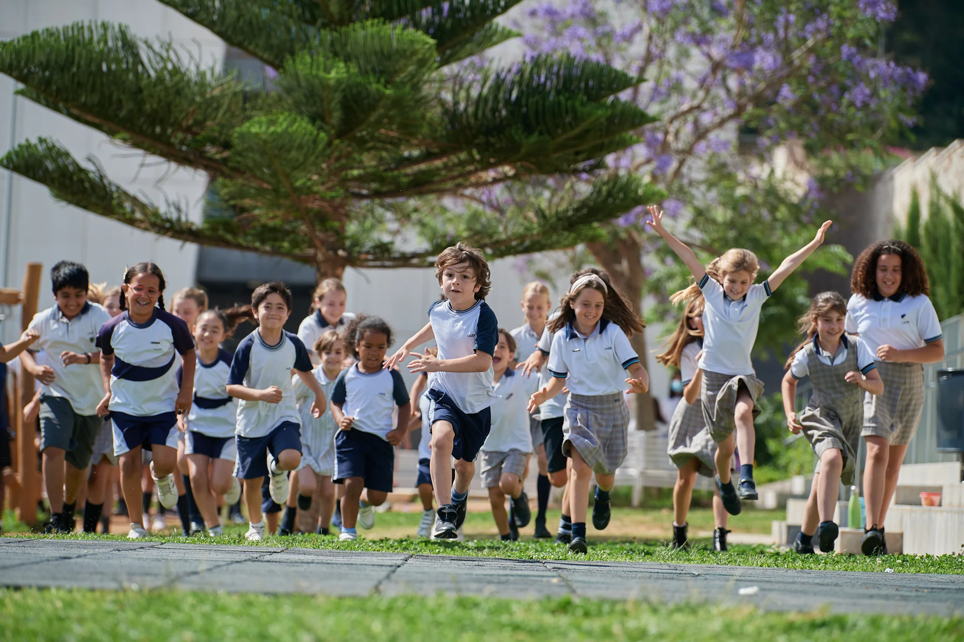 children running in the schoolyard