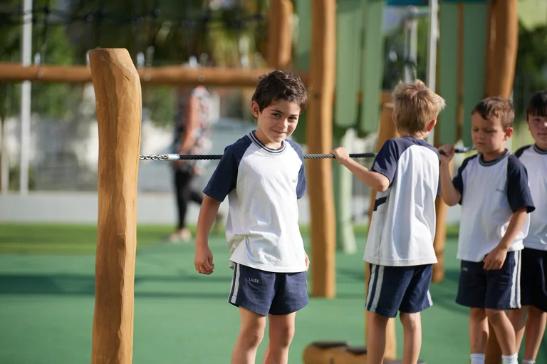 Students playing rope in the schoolyard